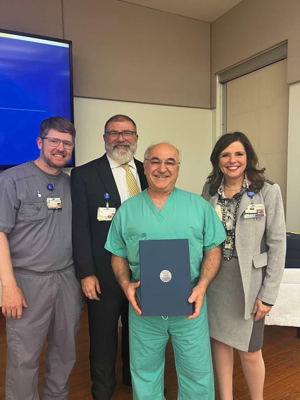 From left are President/CEO Michele Sutton, FACHE; 2023 Physician of the Year 何塞中东和北非地区, MD, FACS; Chief Medical Officer Robert Peltier, MD; 和 Stephen Graham, MD, who was named Physician of the Year in 2022.